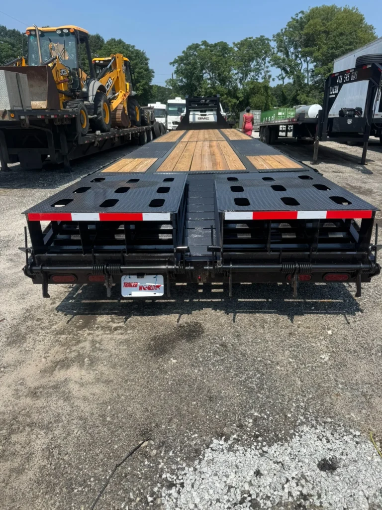 Empty Big Tex flatbed trailer showing deck layout and loading surface